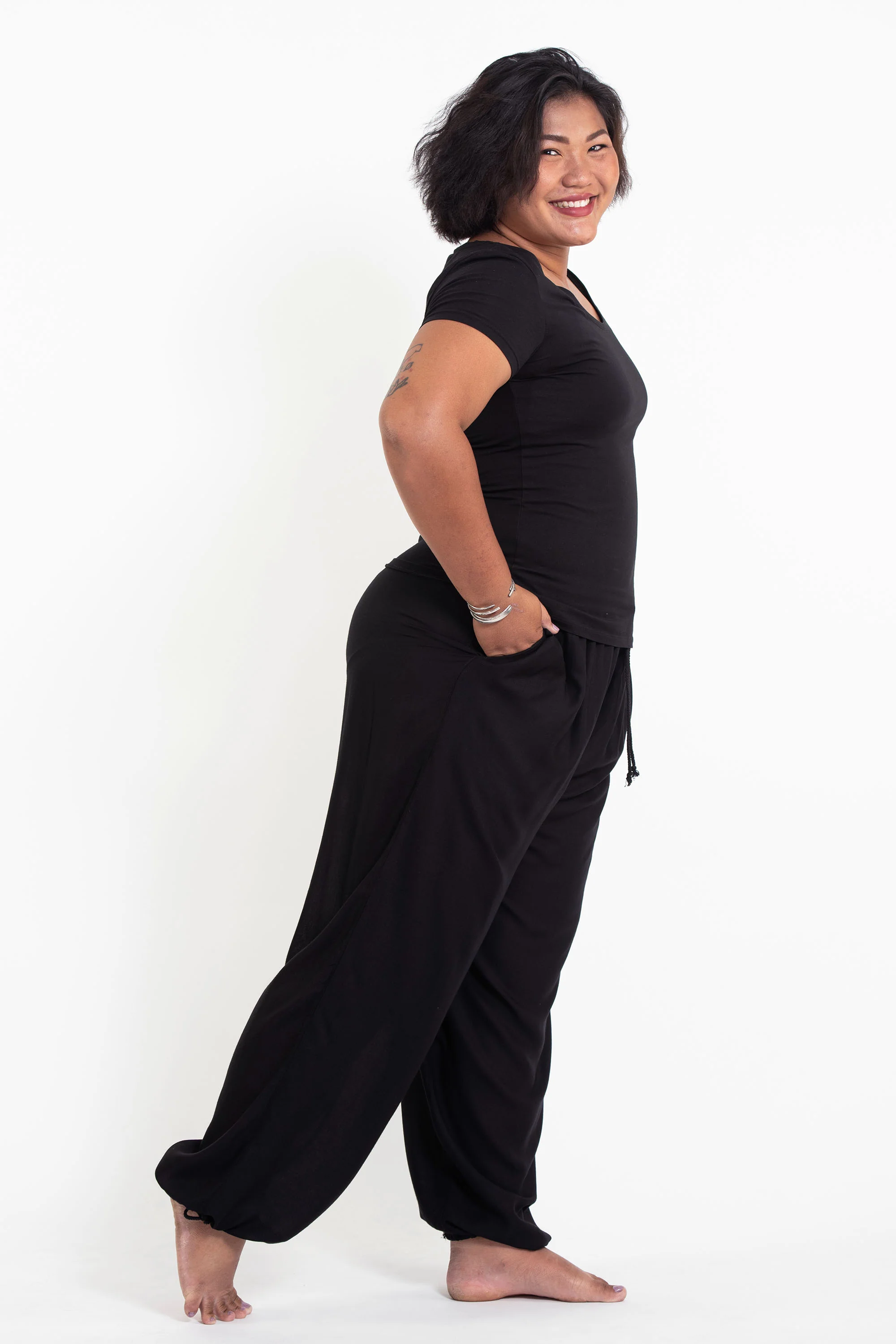 1412-Plus-Size-Solid-Color-Drawstring-Women-s-Yoga-Massage-Pants-in-Black-3.webp Plus Size Solid Color Drawstring Women's Yoga Massage Pants in Black