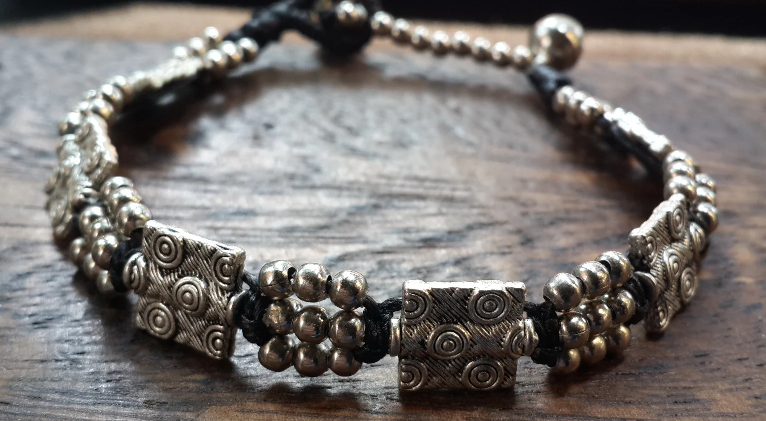 166-Hill-Tribe-Silver-Bead-And-Tribal-Block-Charm-Bracelets-3.webp Hill Tribe Silver Bead And Tribal Block Charm Bracelets